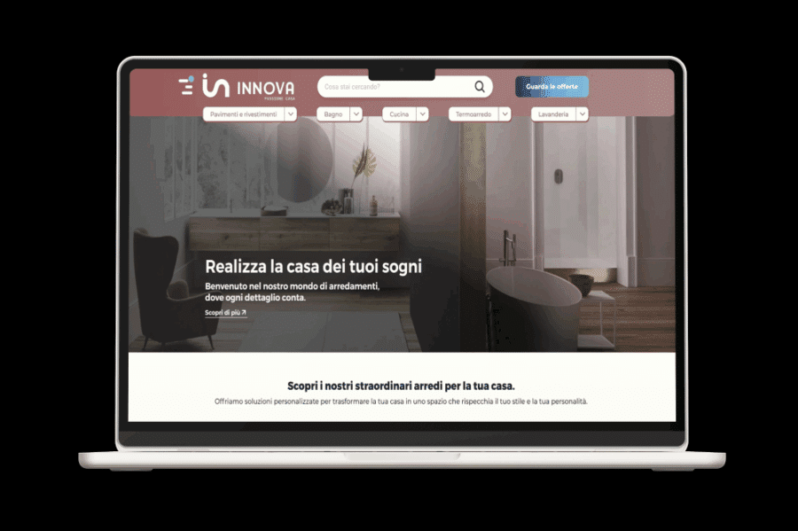 Mockup sito web Innova Arredamenti su MacBook con design moderno per azienda di arredamento
